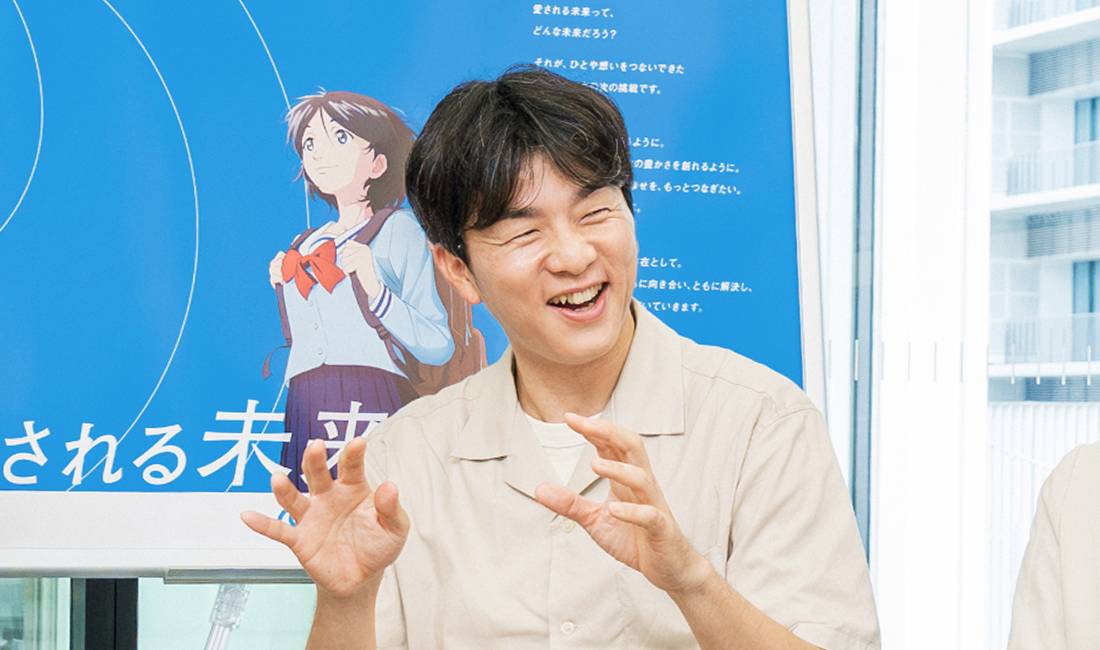 笑う塚本さん